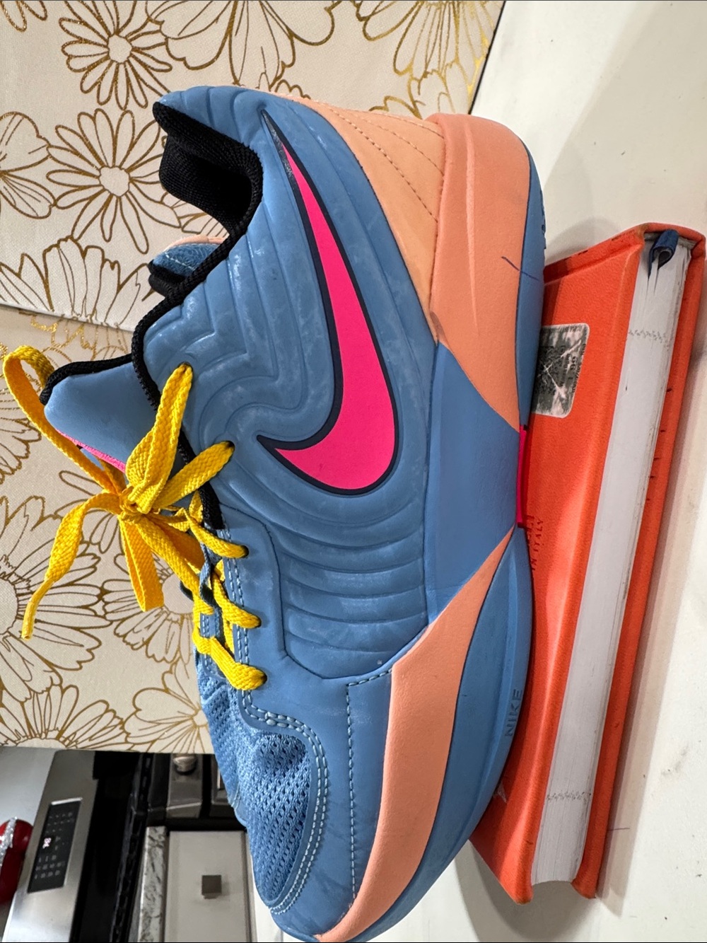 Nike Blue Sneakers with Pink Swoosh and Yellow Laces